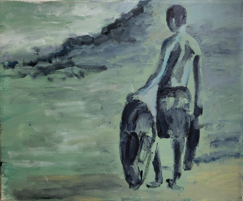 A boy with a surf board